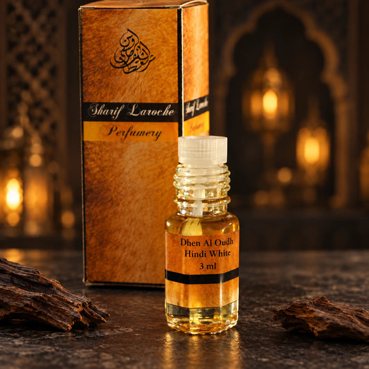 Dhen Al Oudh Hindi White 3ml perfume oil bottle and original box in a dark oriental setting