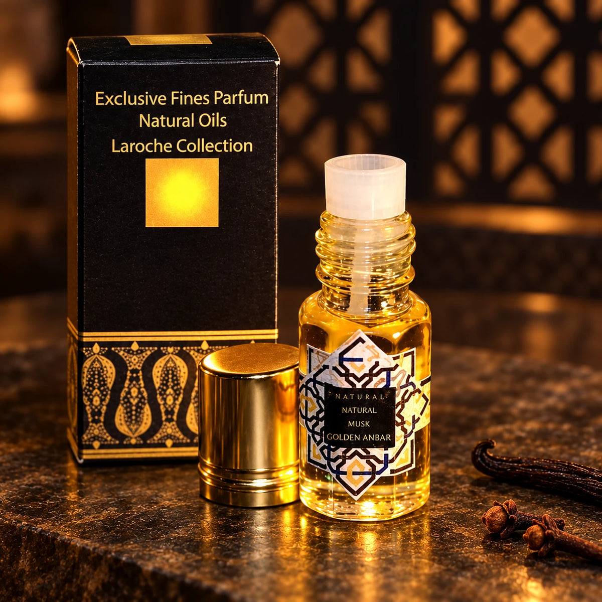 Egyptian Musk Golden Anbar 3ml perfume oil, close-up of glass vial, applicator, gold cap and black-and-gold presentation box.