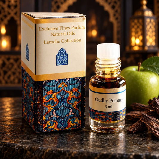 Oudhy Pomme – Apple & Oud Perfume Oil 3ml bottle and original box in a dark oriental setting